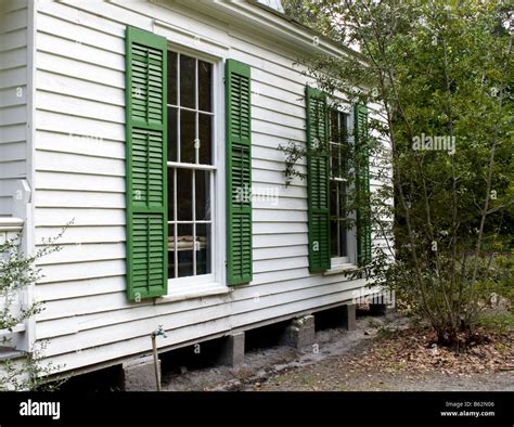 green shutters for white house.